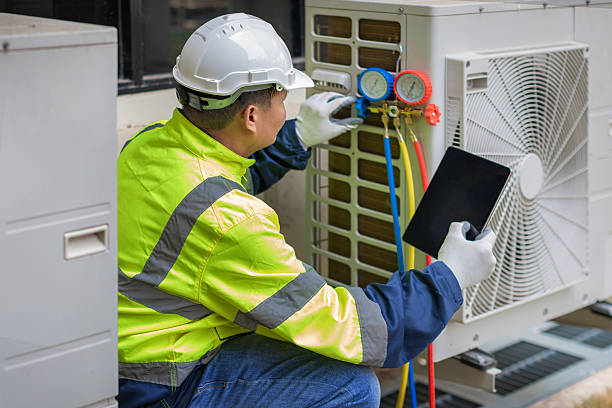 Professional Hvac technician working in Dover, MA
